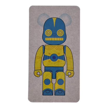 Bearbrick Series 45 H×S (Hirota Saigansho) "Softvinyl Toy" Yellow 100% SECRET Begleitkarte