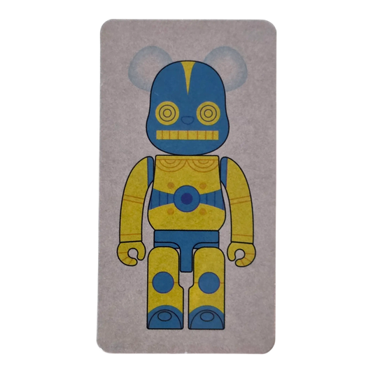 Bearbrick Series 45 H×S (Hirota Saigansho) "Softvinyl Toy" Yellow 100% SECRET Begleitkarte